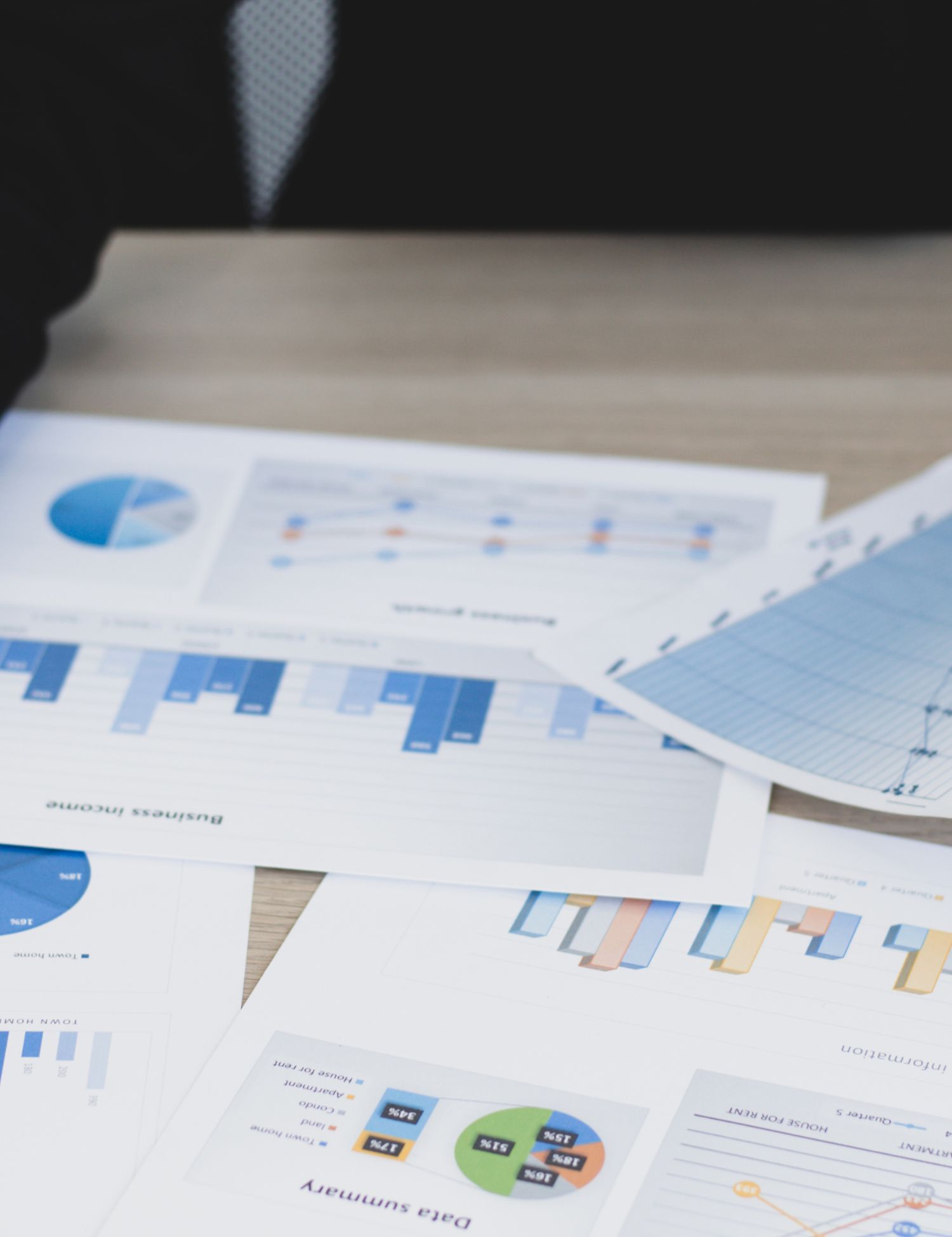 papers and charts on a desk